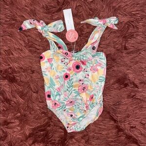 Baileys Blossoms Floral Baby onesie with Bow Straps